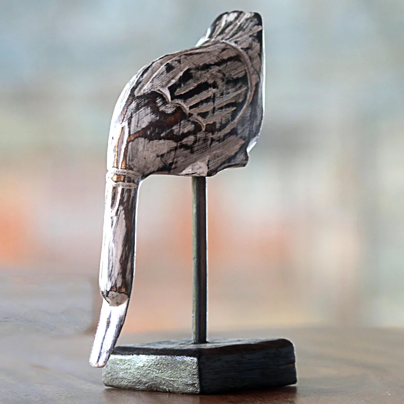- Remote interactive pet feederThe Duck Hand Carved Wood Sculpture of a White Duck from Indonesia - Remote interactive pet feederThe Duck Hand Carved Wood Sculpture of a White Duck from Indonesia