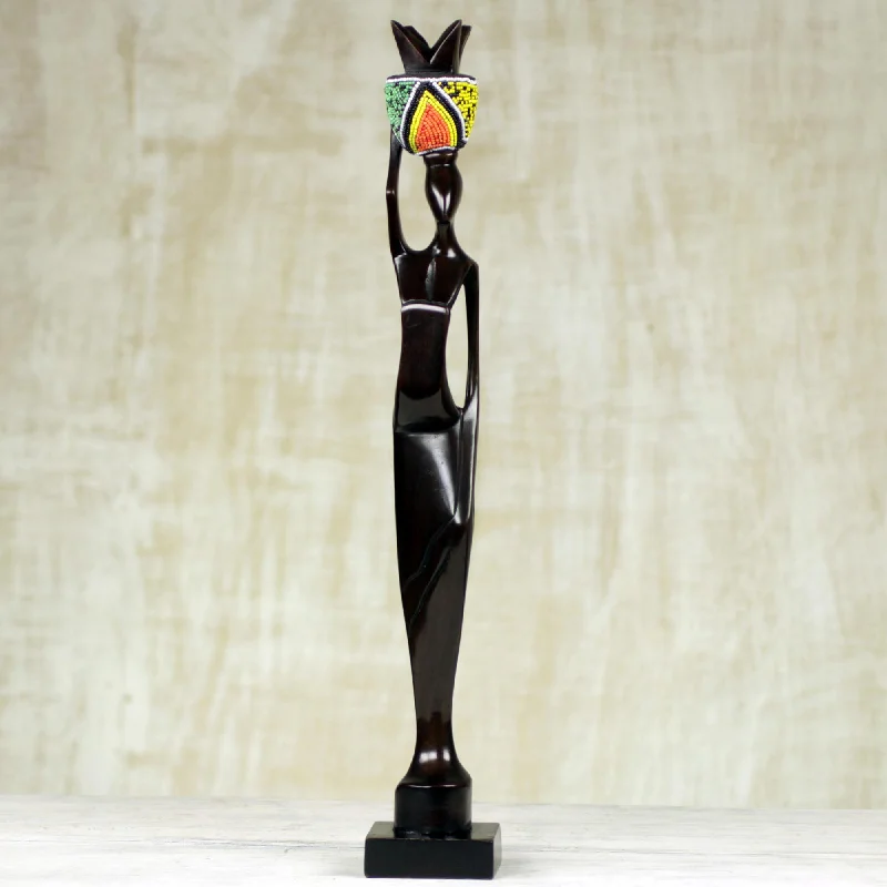 - Car dog seat beltAkatua Handmade Ghanaian Ebony Wood and Recycled Glass Sculpture