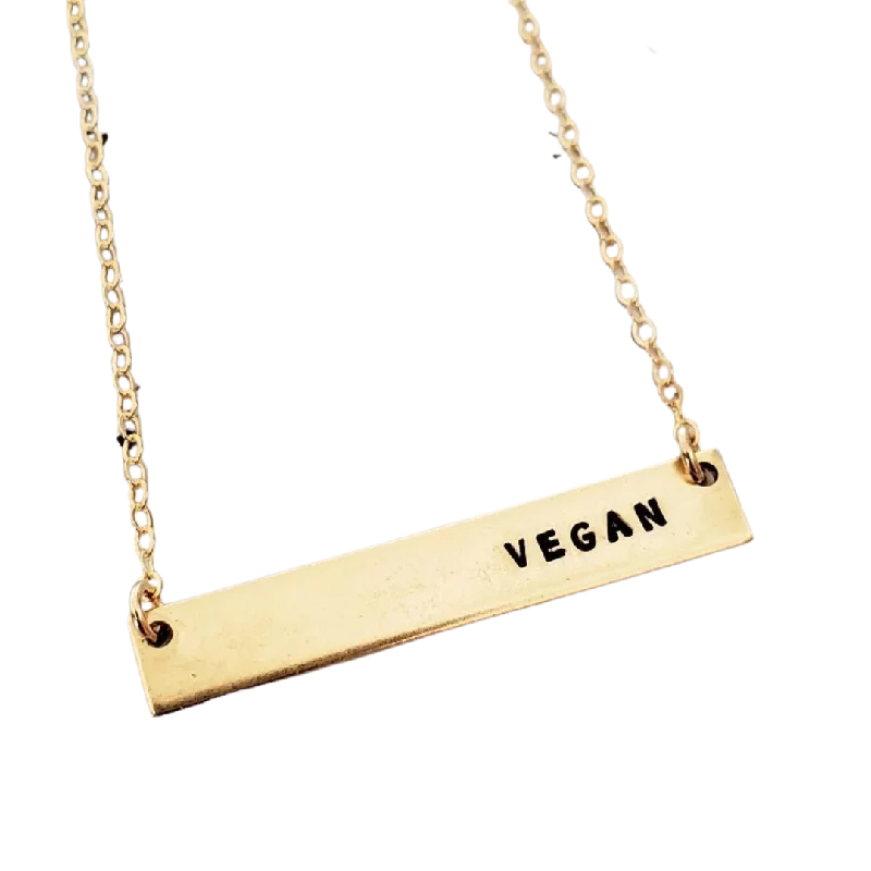- ​​Pet toys under    yuanSalt & Sparkle 'Vegan' Gold Bar Necklace