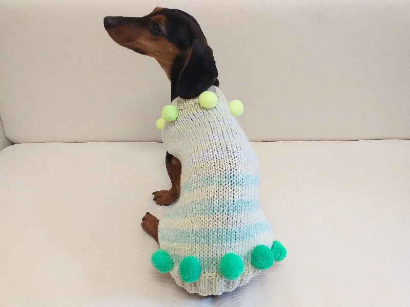 - Cat hair ball removal and hair removal creamChristmas sweater with pom-poms for mini dachshund or small dog